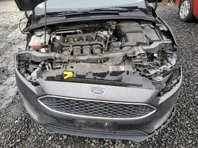 Photo 10 VIN: 1FADP3F26GL369936 - FORD FOCUS SE 