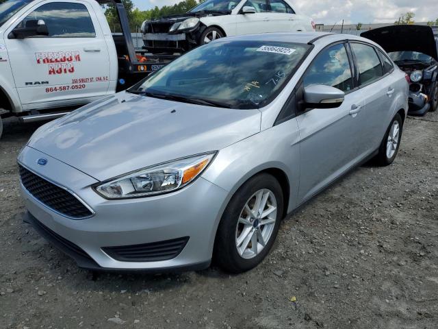 Photo 1 VIN: 1FADP3F26GL389409 - FORD FOCUS SE 