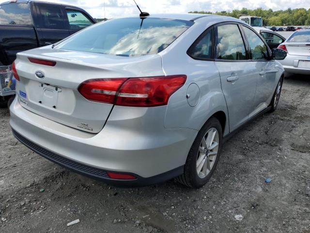 Photo 3 VIN: 1FADP3F26GL389409 - FORD FOCUS SE 