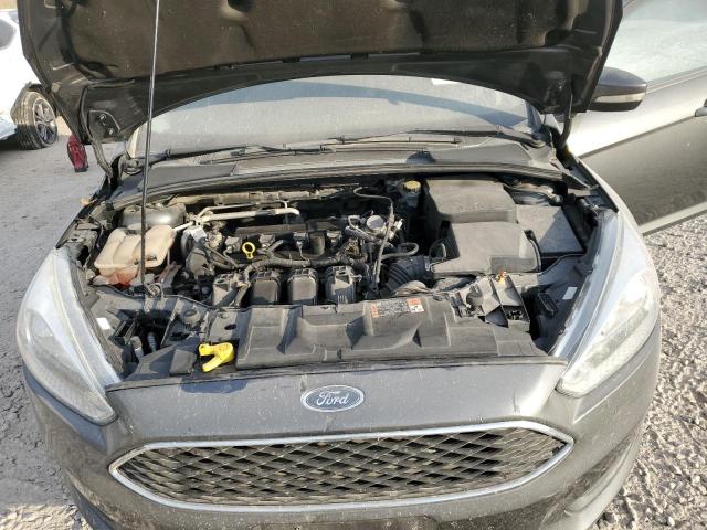 Photo 10 VIN: 1FADP3F26GL390267 - FORD FOCUS SE 