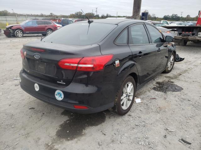 Photo 3 VIN: 1FADP3F26GL390835 - FORD FOCUS SE 