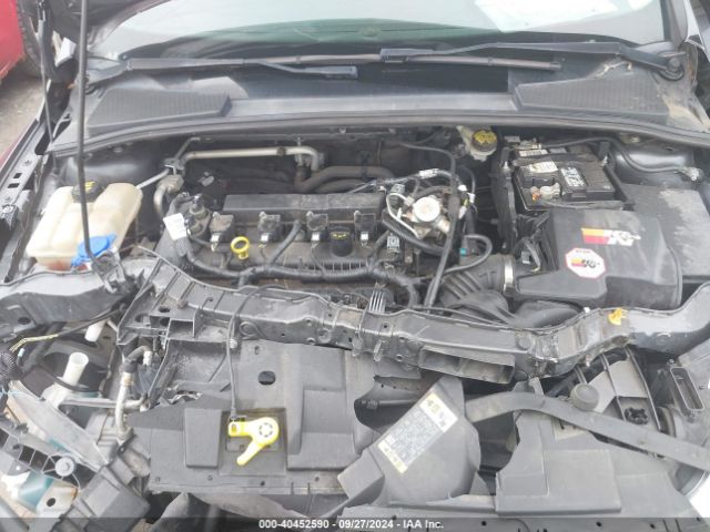 Photo 9 VIN: 1FADP3F26GL394240 - FORD FOCUS 