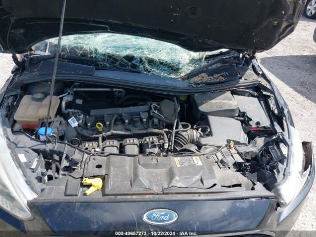 Photo 9 VIN: 1FADP3F26GL400599 - FORD FOCUS 