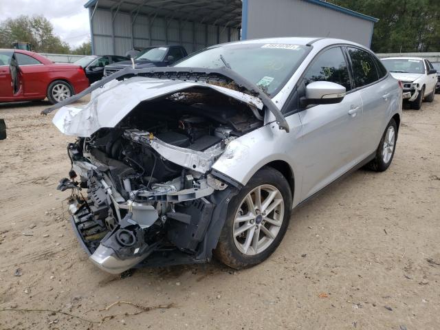 Photo 1 VIN: 1FADP3F26GL404121 - FORD FOCUS SE 