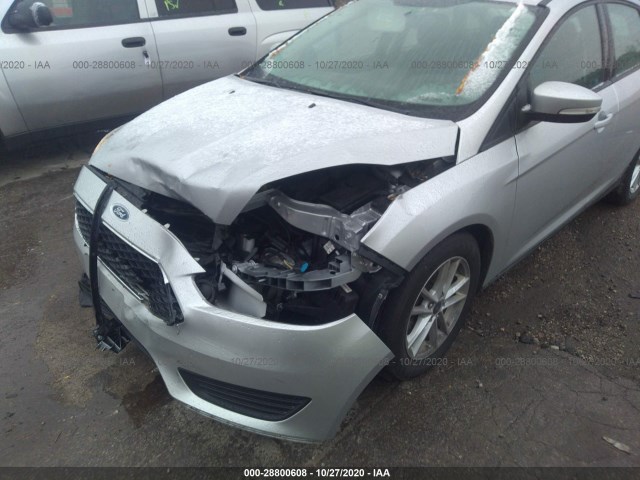 Photo 5 VIN: 1FADP3F26HL206348 - FORD FOCUS 