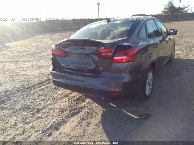 Photo 5 VIN: 1FADP3F26HL235090 - FORD FOCUS 