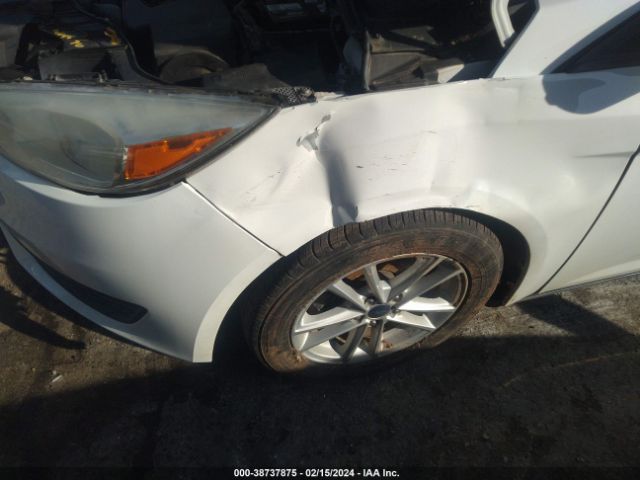 Photo 5 VIN: 1FADP3F26HL259681 - FORD FOCUS 