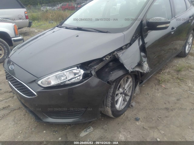 Photo 5 VIN: 1FADP3F26HL274696 - FORD FOCUS 