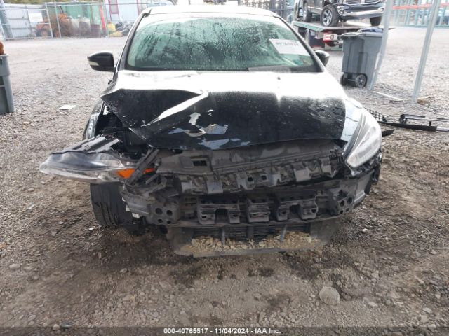 Photo 5 VIN: 1FADP3F26HL297573 - FORD FOCUS 