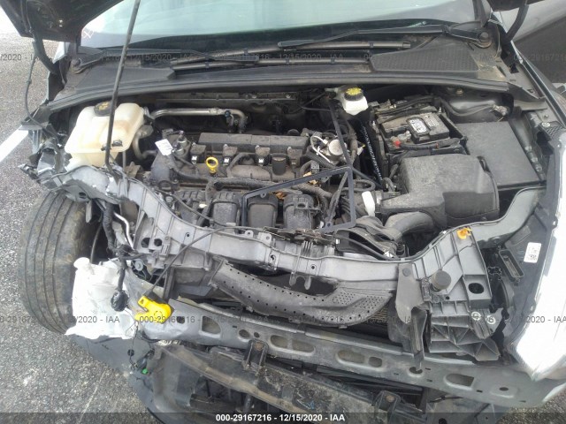 Photo 9 VIN: 1FADP3F26HL309205 - FORD FOCUS 