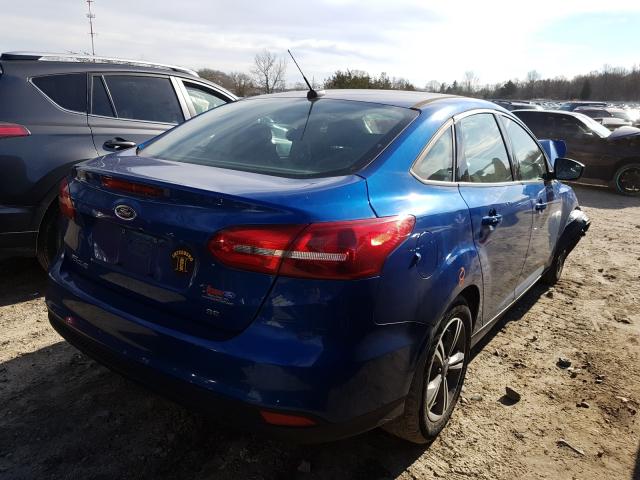 Photo 3 VIN: 1FADP3F26JL200488 - FORD FOCUS SE 