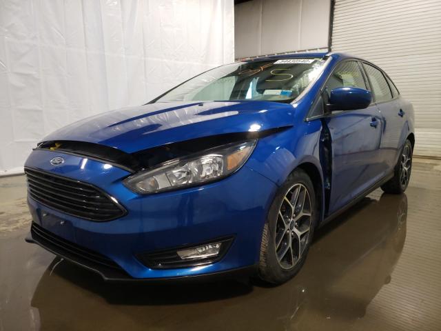 Photo 1 VIN: 1FADP3F26JL208235 - FORD FOCUS 