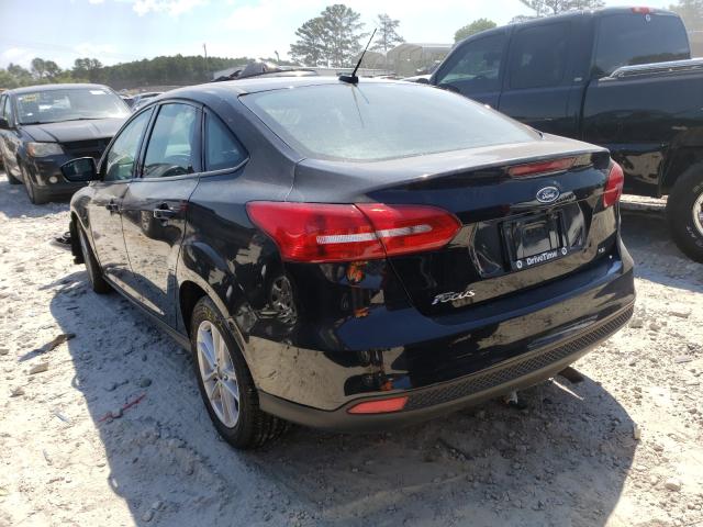 Photo 2 VIN: 1FADP3F26JL262070 - FORD FOCUS SE 