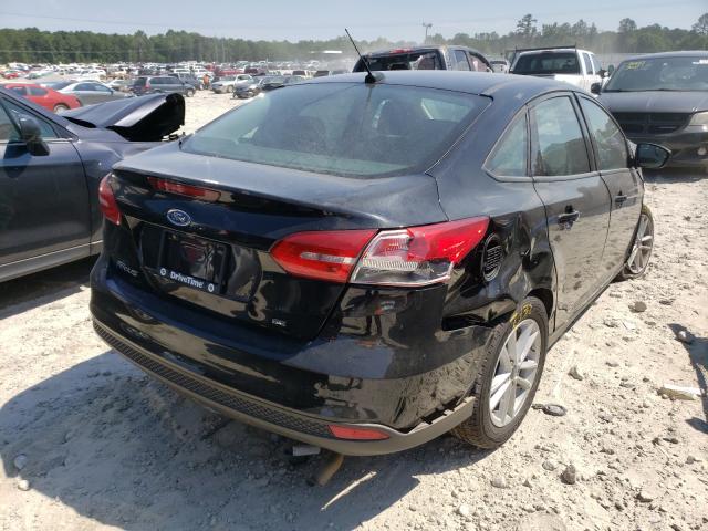 Photo 3 VIN: 1FADP3F26JL262070 - FORD FOCUS SE 