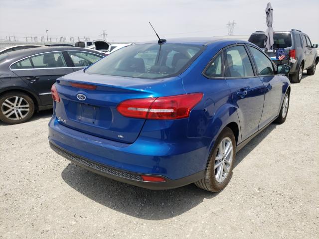 Photo 3 VIN: 1FADP3F26JL262456 - FORD FOCUS SE 