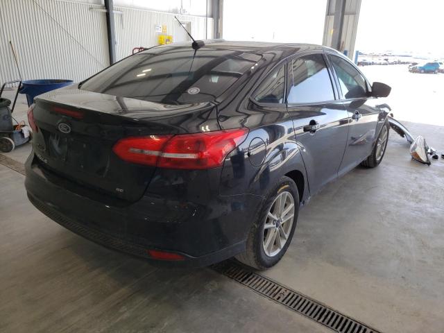 Photo 3 VIN: 1FADP3F26JL269892 - FORD FOCUS SE 