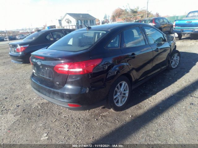 Photo 3 VIN: 1FADP3F26JL274557 - FORD FOCUS 