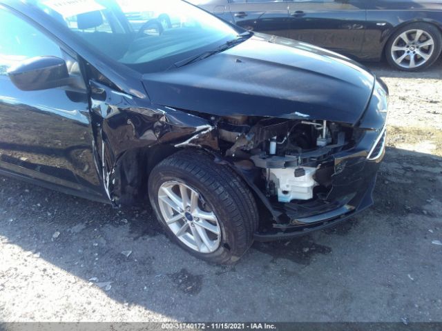 Photo 5 VIN: 1FADP3F26JL274557 - FORD FOCUS 