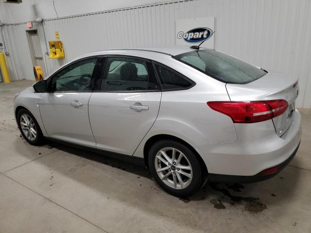 Photo 1 VIN: 1FADP3F26JL297501 - FORD FOCUS SE 