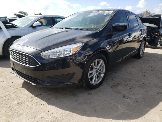 Photo 1 VIN: 1FADP3F26JL299636 - FORD FOCUS SE 