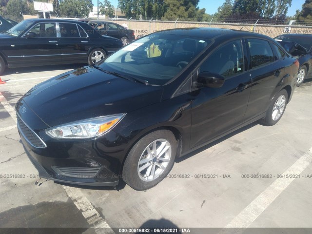 Photo 1 VIN: 1FADP3F26JL323062 - FORD FOCUS 