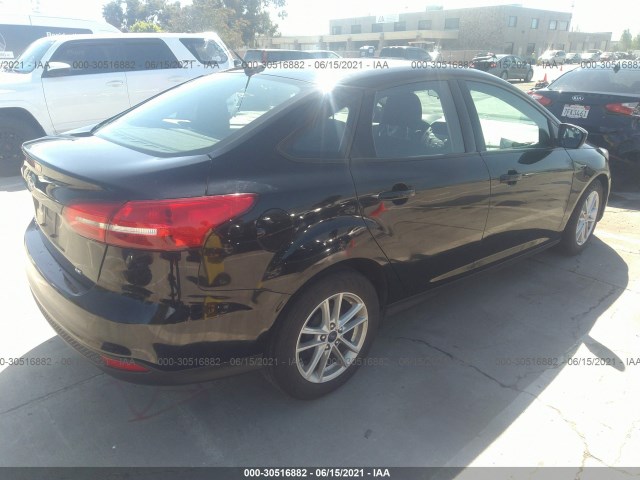 Photo 3 VIN: 1FADP3F26JL323062 - FORD FOCUS 