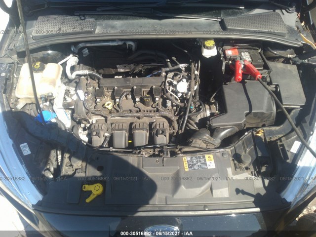 Photo 9 VIN: 1FADP3F26JL323062 - FORD FOCUS 