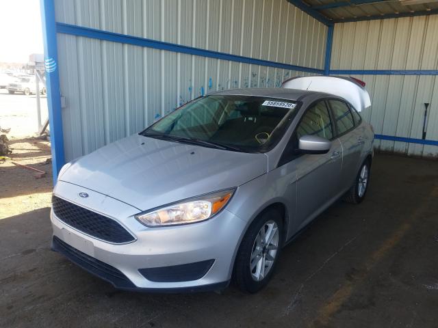 Photo 1 VIN: 1FADP3F26JL324387 - FORD FOCUS SE 