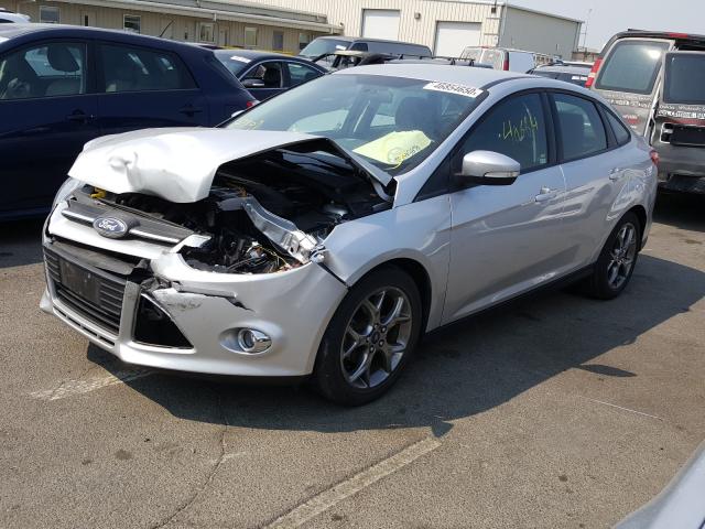 Photo 1 VIN: 1FADP3F27DL108097 - FORD FOCUS SE 