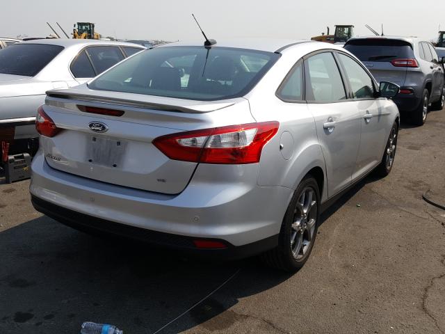 Photo 3 VIN: 1FADP3F27DL108097 - FORD FOCUS SE 