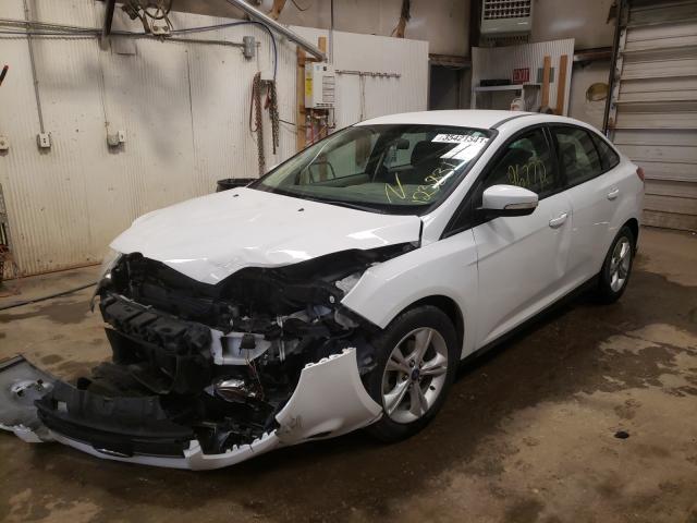 Photo 1 VIN: 1FADP3F27DL123831 - FORD FOCUS SE 