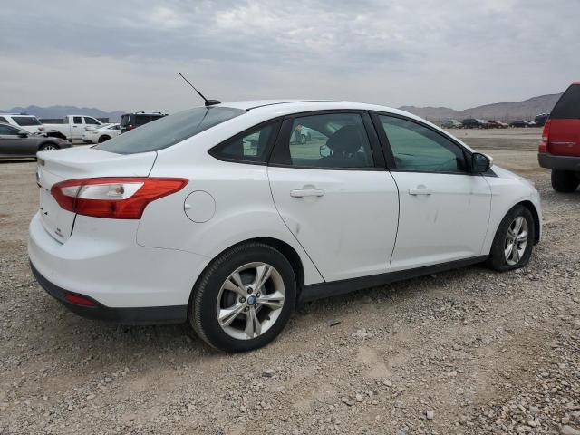 Photo 2 VIN: 1FADP3F27DL132660 - FORD FOCUS SE 