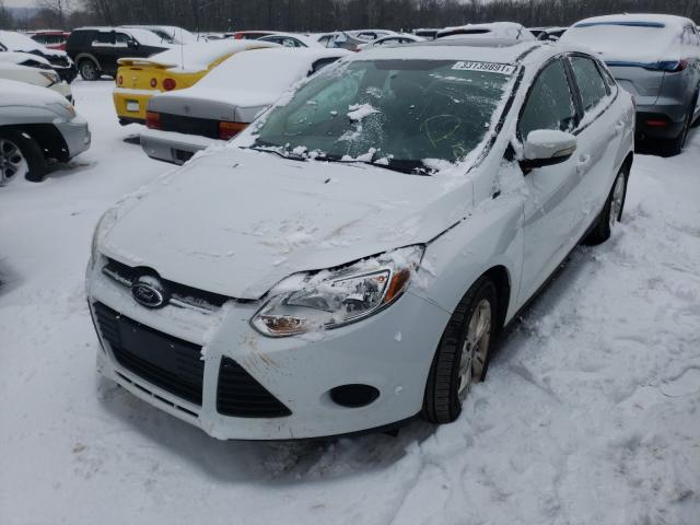 Photo 1 VIN: 1FADP3F27DL145716 - FORD FOCUS SE 