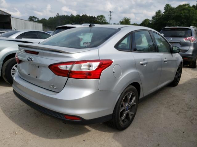 Photo 3 VIN: 1FADP3F27DL153122 - FORD FOCUS SE 