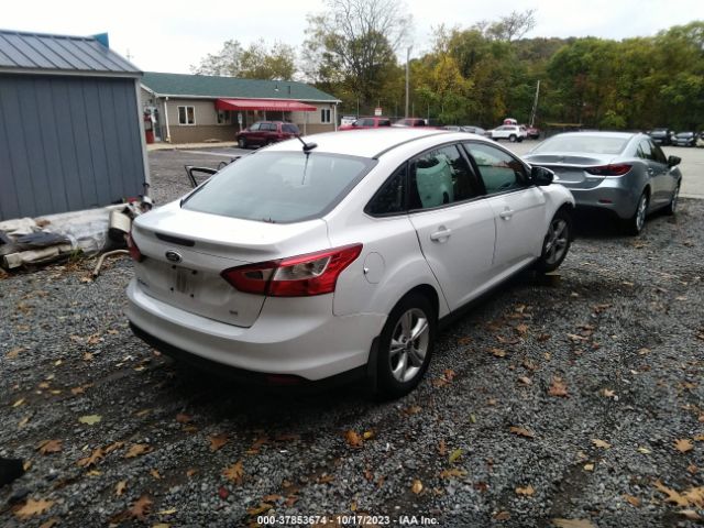 Photo 3 VIN: 1FADP3F27DL182250 - FORD FOCUS 