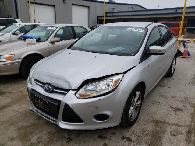 Photo 1 VIN: 1FADP3F27DL216087 - FORD FOCUS SE 