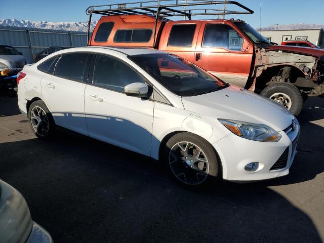 Photo 3 VIN: 1FADP3F27DL227039 - FORD FOCUS SE 