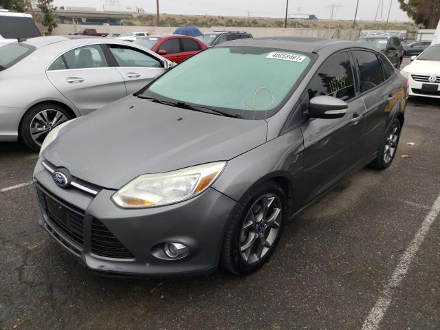 Photo 1 VIN: 1FADP3F27DL235223 - FORD FOCUS SE 