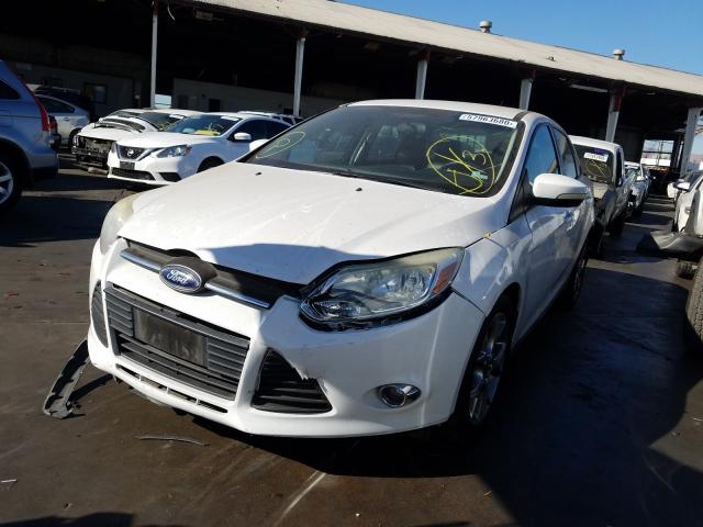 Photo 1 VIN: 1FADP3F27DL252717 - FORD FOCUS SE 