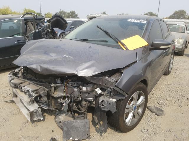 Photo 1 VIN: 1FADP3F27DL284728 - FORD FOCUS SE 