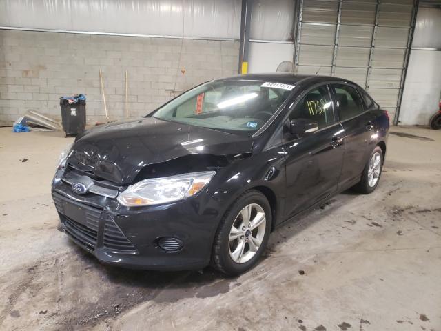 Photo 1 VIN: 1FADP3F27DL297527 - FORD FOCUS SE 