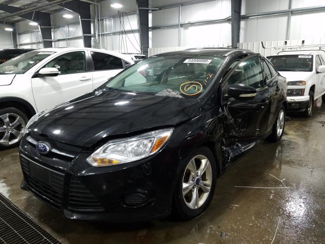 Photo 1 VIN: 1FADP3F27DL307506 - FORD FOCUS SE 