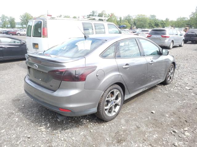 Photo 3 VIN: 1FADP3F27DL320322 - FORD FOCUS SE 