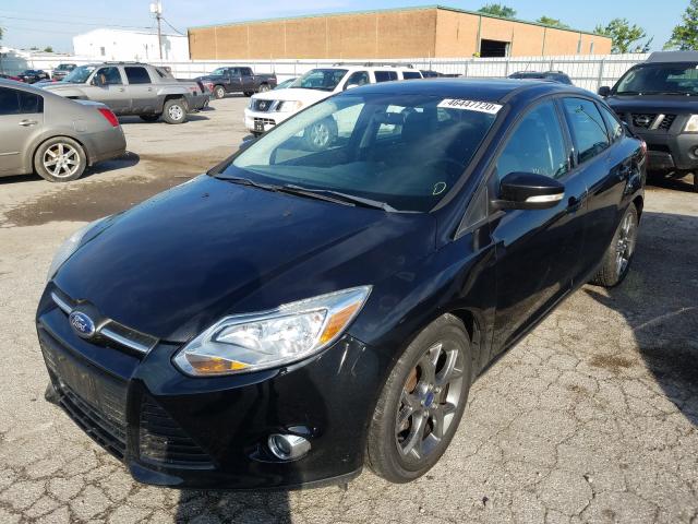 Photo 1 VIN: 1FADP3F27DL343115 - FORD FOCUS SE 