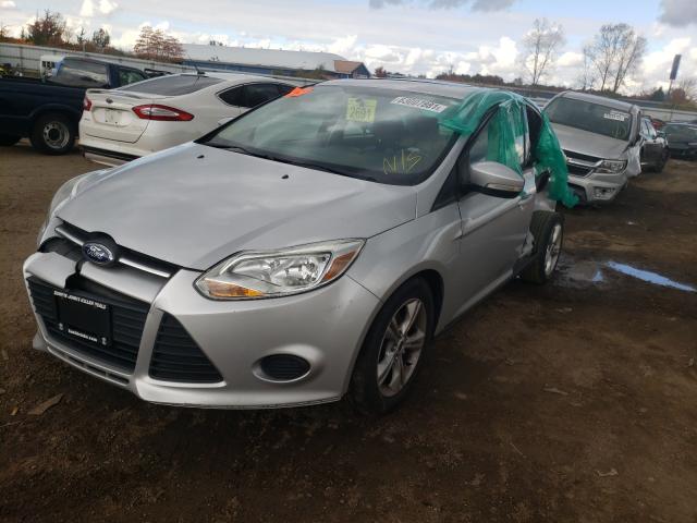 Photo 1 VIN: 1FADP3F27DL343177 - FORD FOCUS SE 