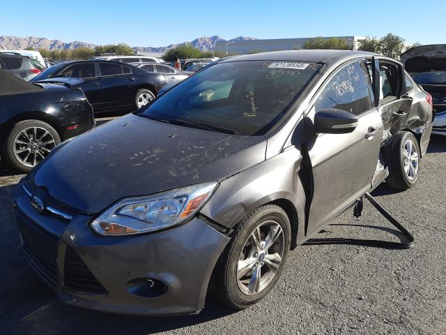 Photo 1 VIN: 1FADP3F27DL352784 - FORD FOCUS SE 