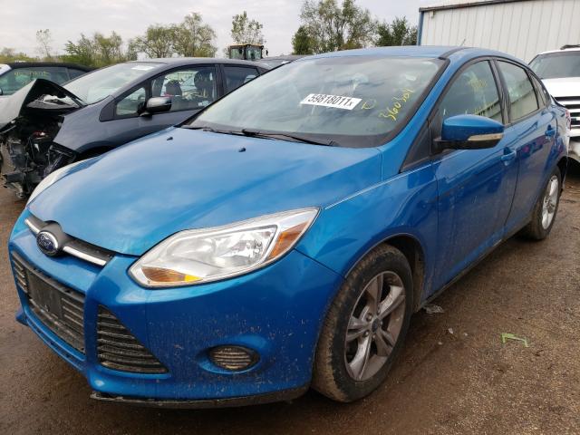 Photo 1 VIN: 1FADP3F27DL360304 - FORD FOCUS SE 