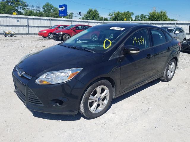 Photo 1 VIN: 1FADP3F27DL360786 - FORD FOCUS SE 