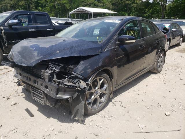 Photo 1 VIN: 1FADP3F27EL114712 - FORD FOCUS SE 