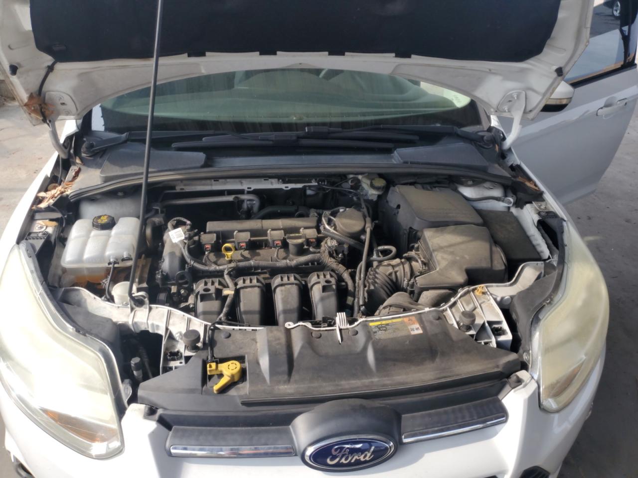 Photo 10 VIN: 1FADP3F27EL222005 - FORD FOCUS 